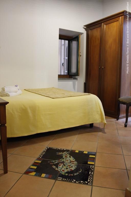 Bed and Breakfast Amalfitani Salerno Centro Habitación foto